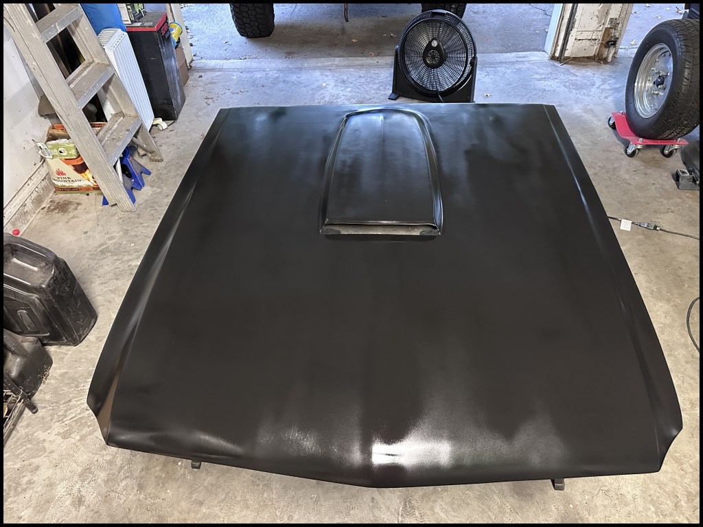 First coat of enamel on the fiberglass hood.