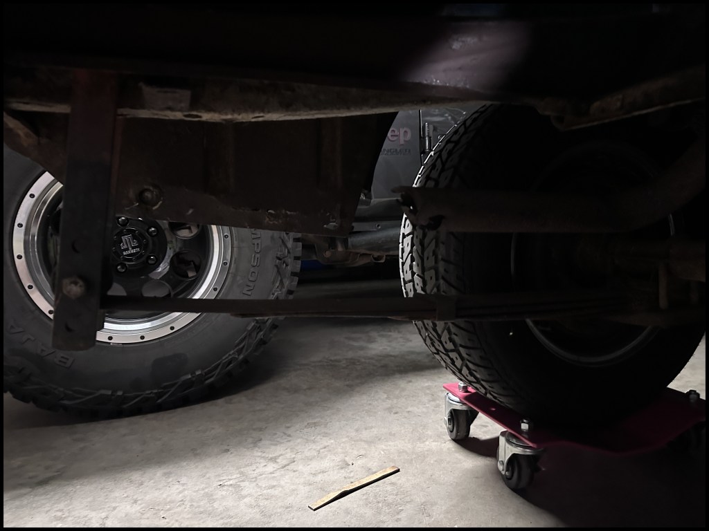 Driver-side under-side trunk frop off rust rot,