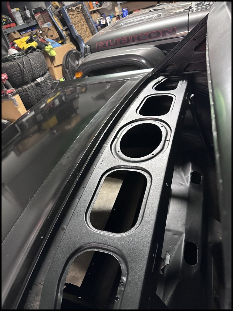 Angle image of package tray after sanding and sealing with rubberized undercoat.